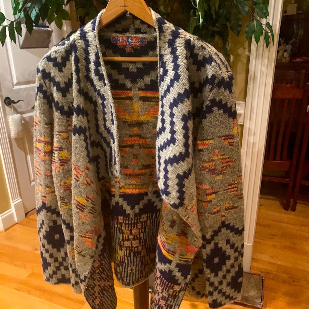 Beautiful sweater by Selfie Couture size large